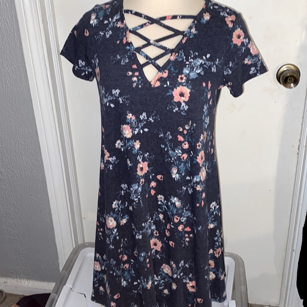 Love,fire dress size Medium floral in navy blue.